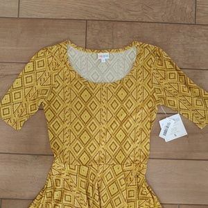 LuLaRoe Dresses - Lularoe yellow patterned Nicole dress size small LuLaRoe Dresses - Lularoe yellow patterned Nicole dress size small